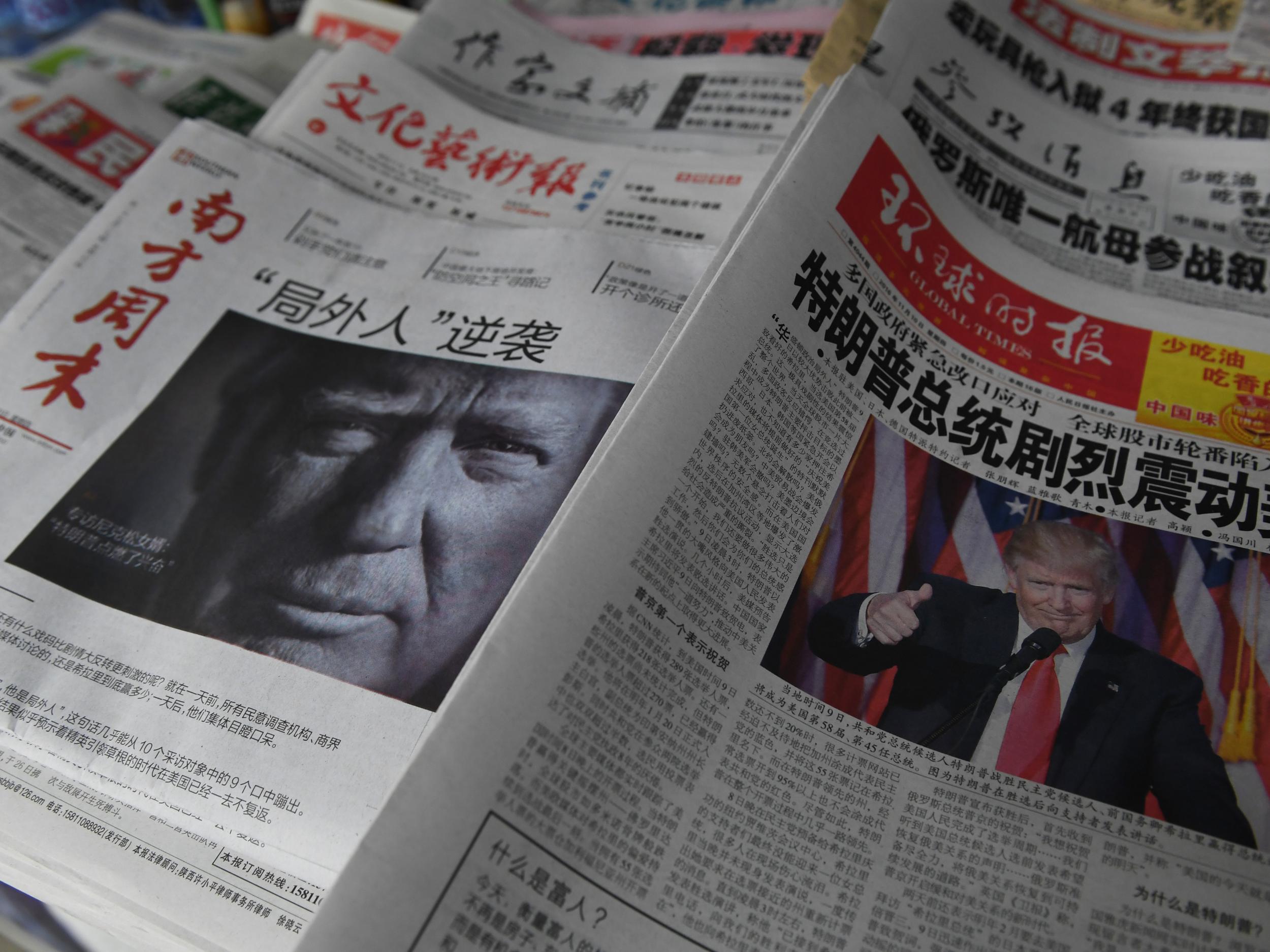 Chinese newspapers feature front page photos of US President-elect Donald Trump