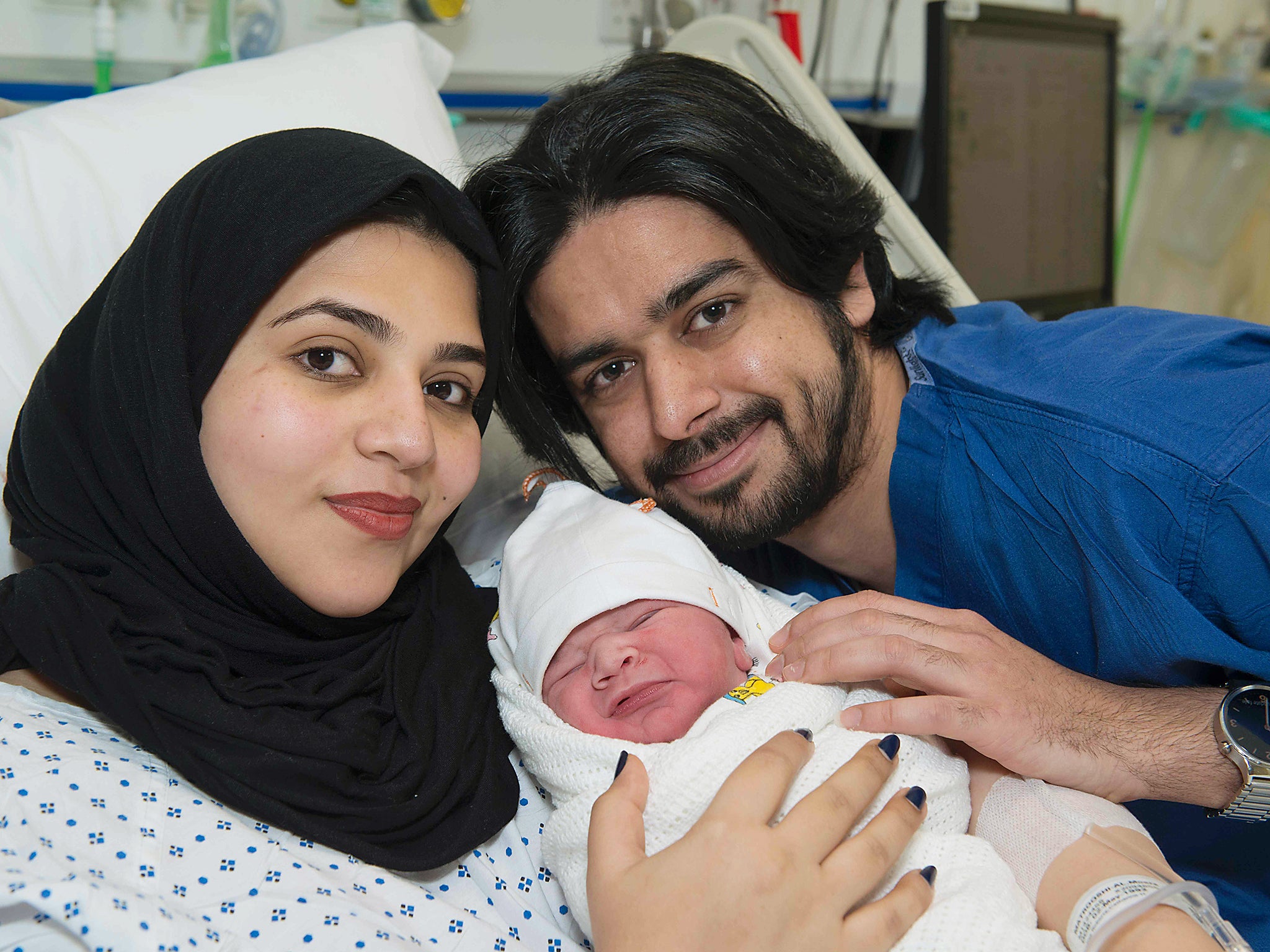 Moaza Al Matrooshi with her husband Ahmed and new-born son at a hospital in London