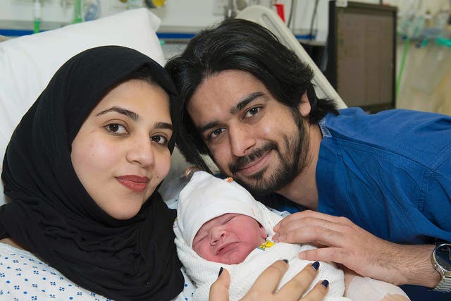 Moaza Al Matrooshi with her husband Ahmed and new-born son at a hospital in London
