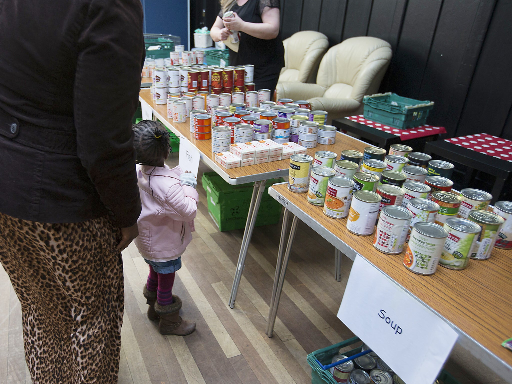 People collecting food from a food bank