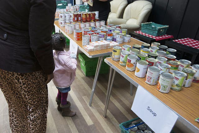 People collecting food from a food bank