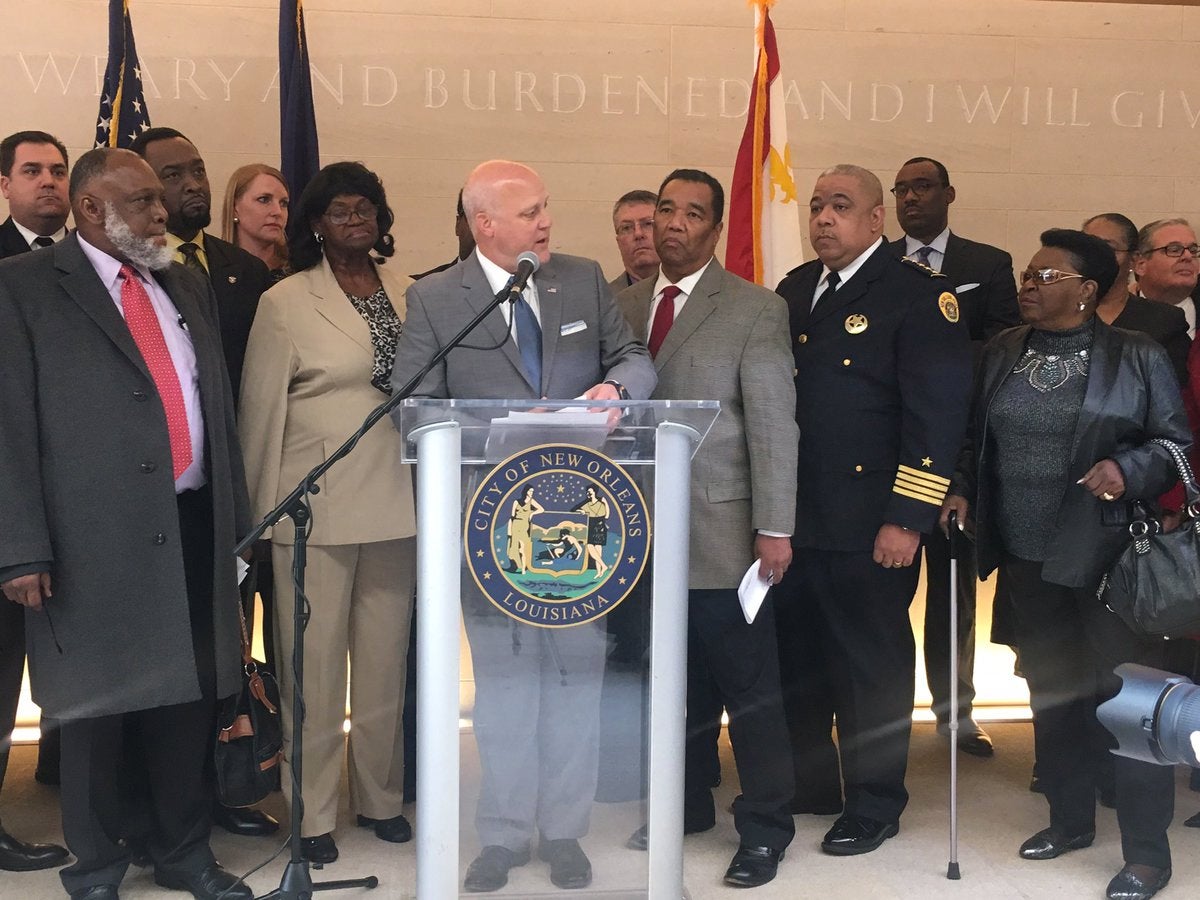 Mayor Landrieu with families of victims in the police attacks