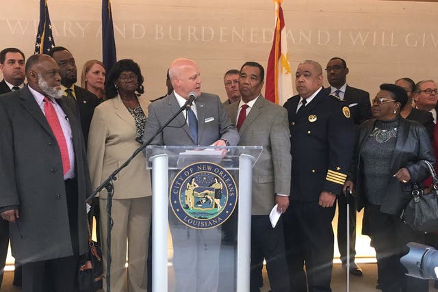 Mayor Landrieu with families of victims in the police attacks