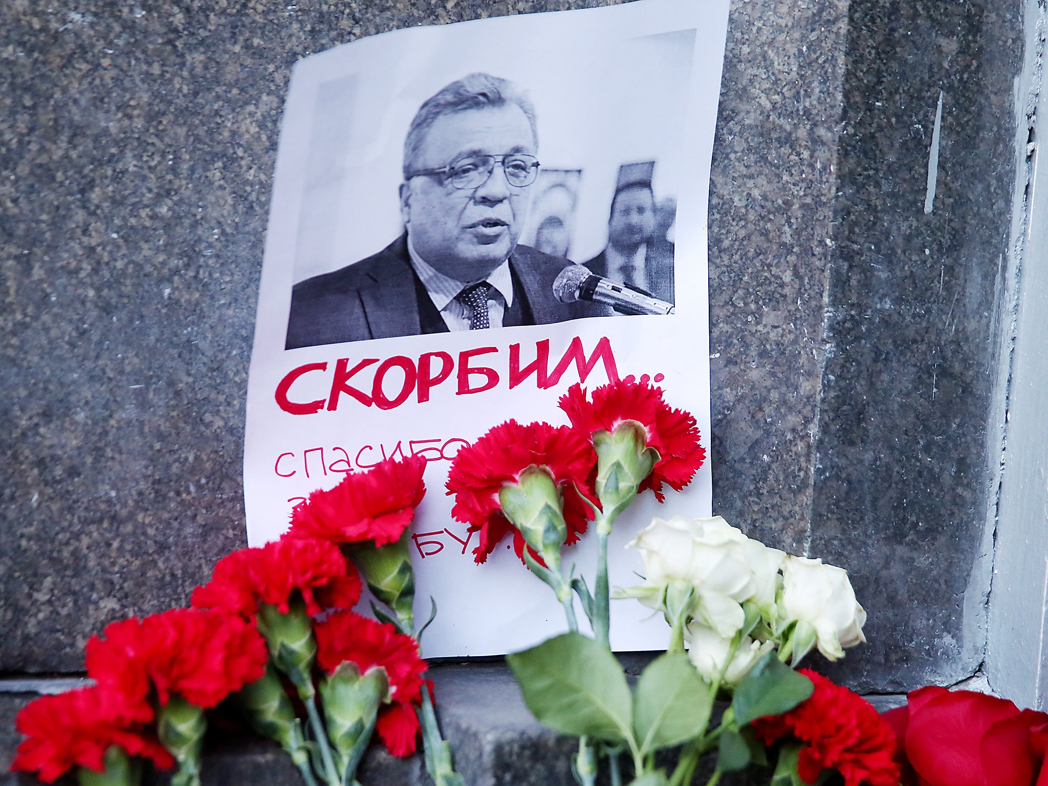 Flowers at the entrance to the Russian Foreign Affairs Ministry building in Moscow, paying tribute to the murdered ambassador to Turkey, Andrei Karlov