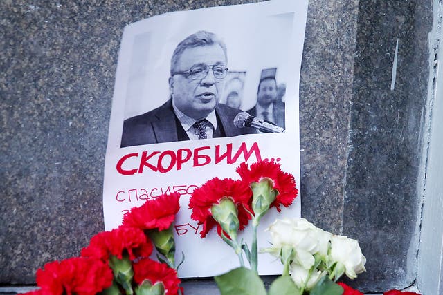 Flowers at the entrance to the Russian Foreign Affairs Ministry building in Moscow, paying tribute to the murdered ambassador to Turkey, Andrei Karlov 