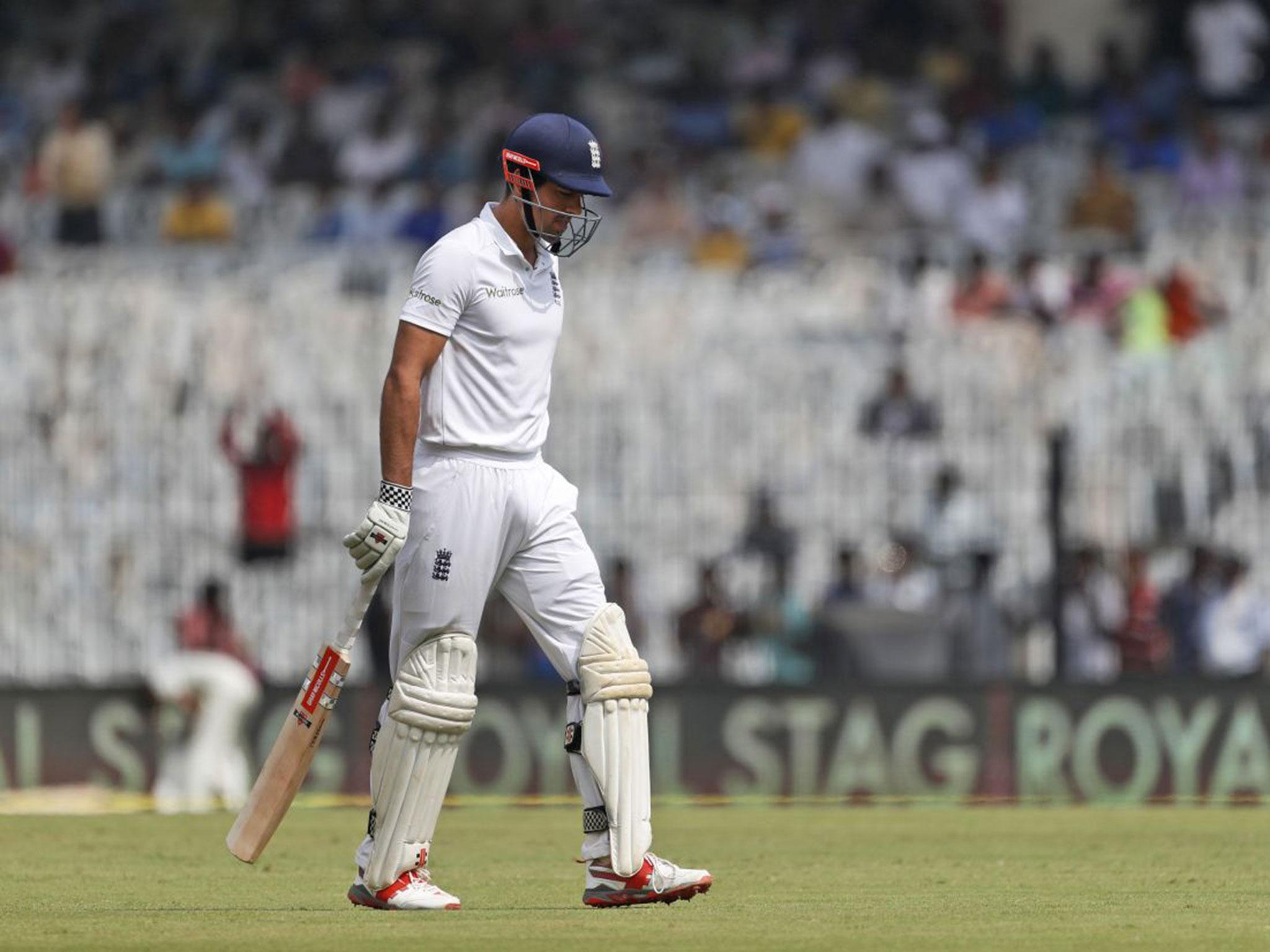 Alastair Cook walks off the field during England's second innings in the fifth Test defeat by India