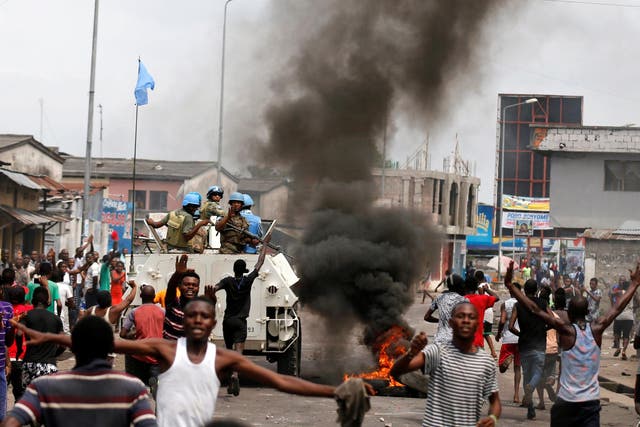 Residents in Kinshasha chant slogans against Congolese President Joseph Kabila