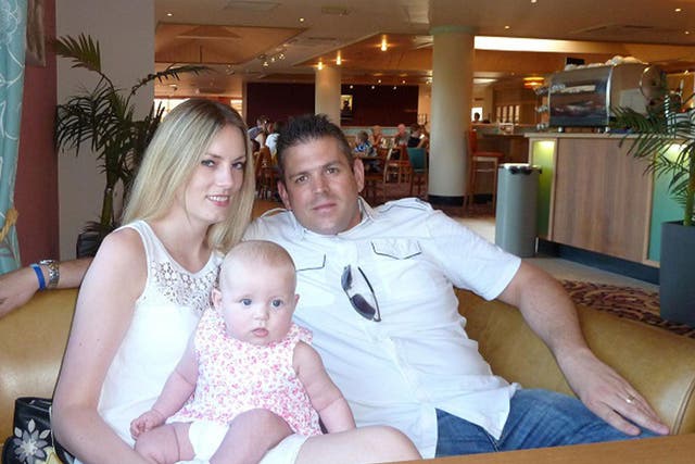 File photo of Paul Briggs, with his wife Lindsey and daughter Ella