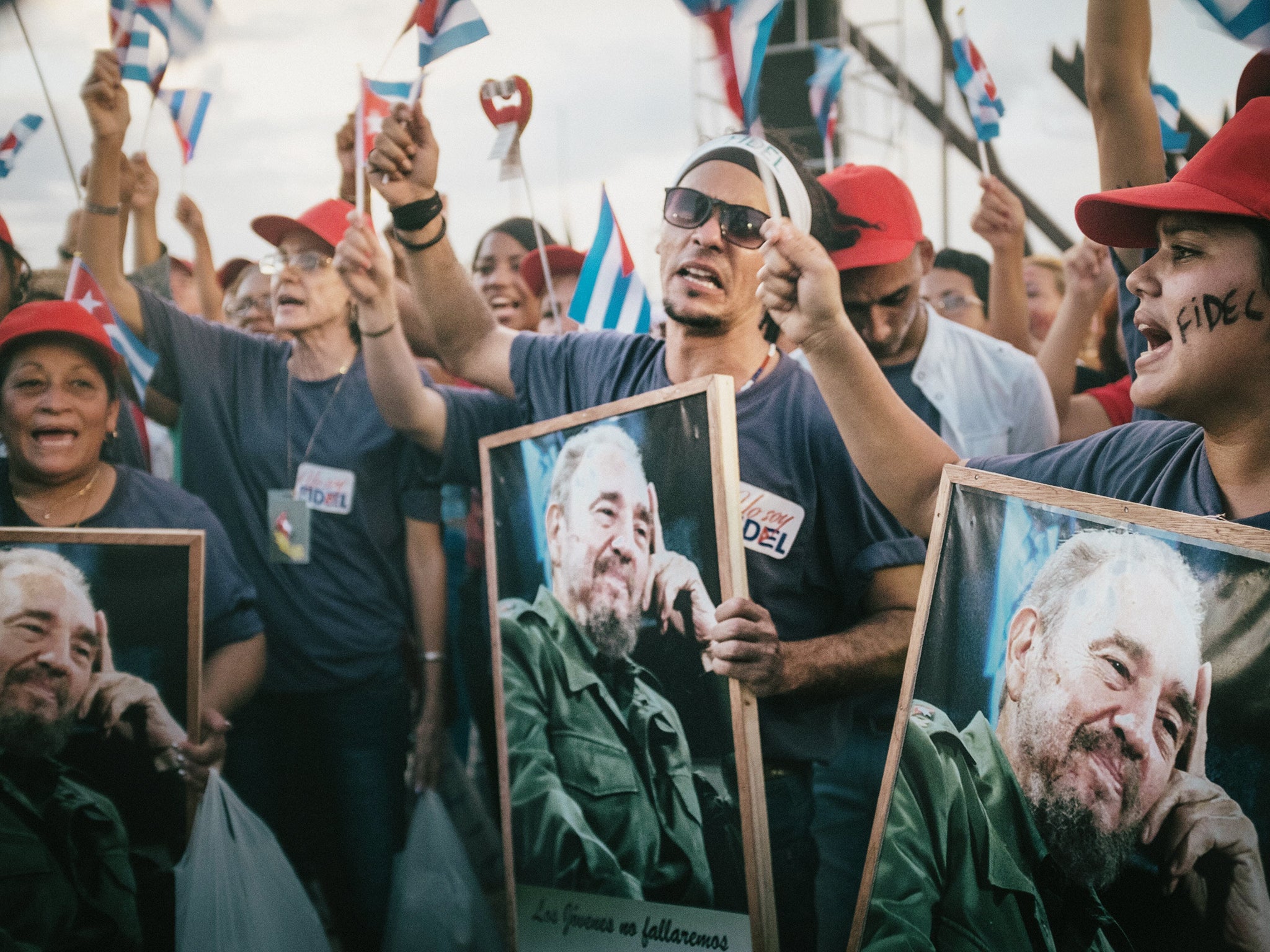 Federación Estudiantil Universitaria (FEU) members attend a mass rally in the Plaza de la Revolución Antonio Maceo in Santiago de Cuba on the eve of Fidel Castro’s funeral