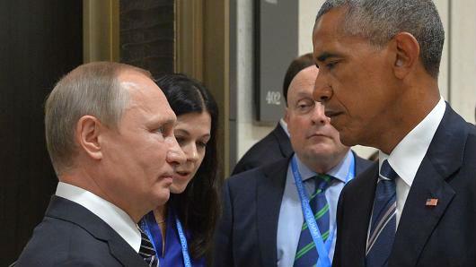 The US leader reportedly told Mr Putin to 'cut it out' when he confronted him about the hacking