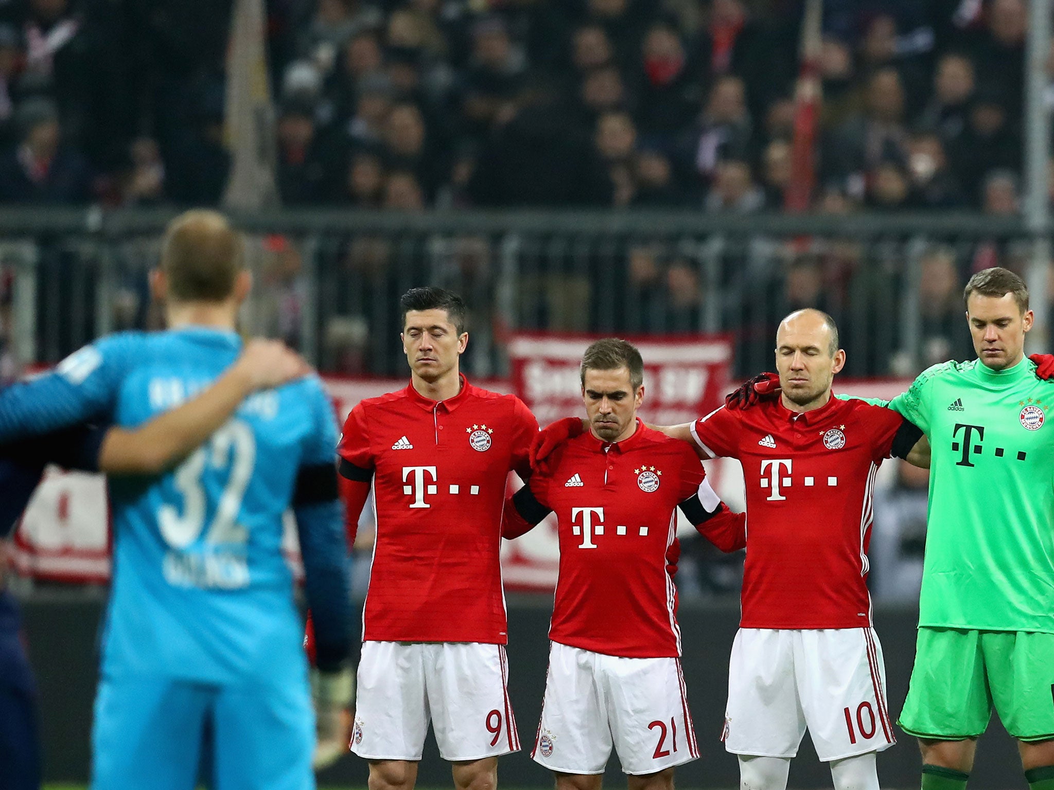 Both teams paid their respects to the victims of the Berlin terror attack before kick-off