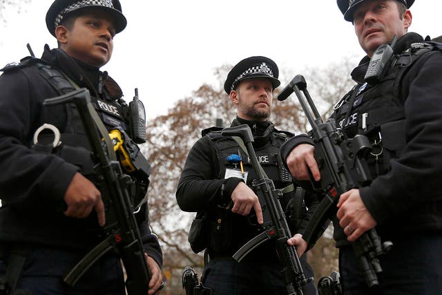 Armed police stand guard in London following the Berlin truck attack. The Counter Extremism Bill could investigate people opposed to British values 