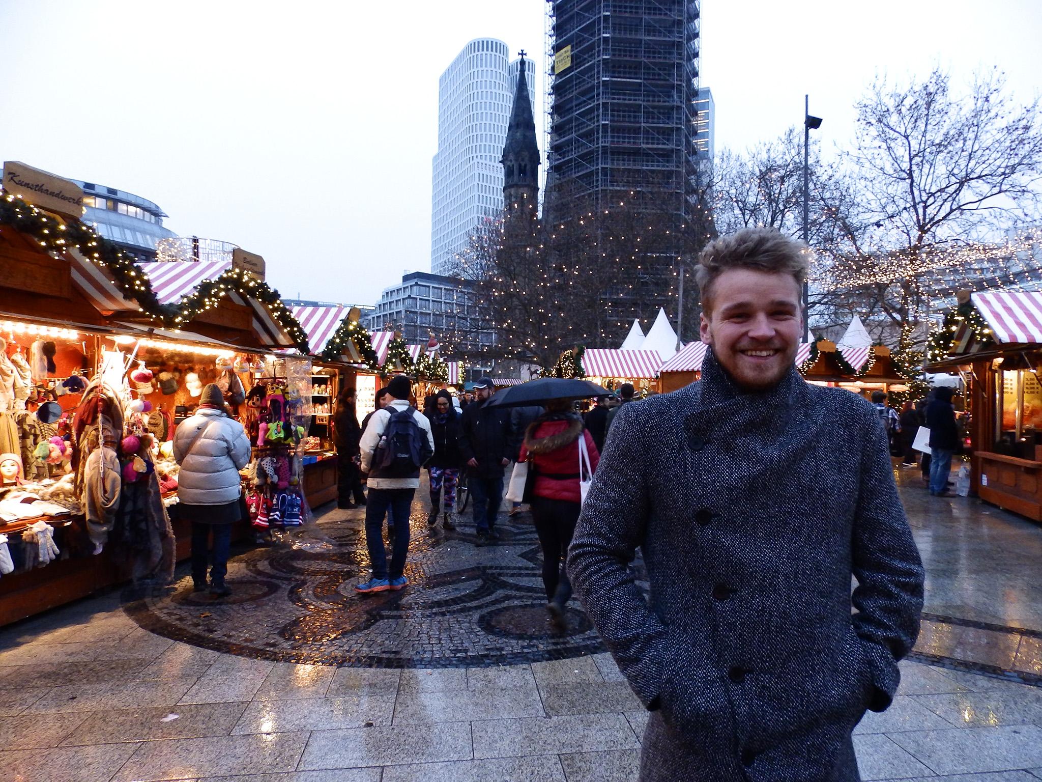Richard Pawson, 24, at the reopened Christmas market next to the Kaiser Wilhelm Memorial Church in Berlin