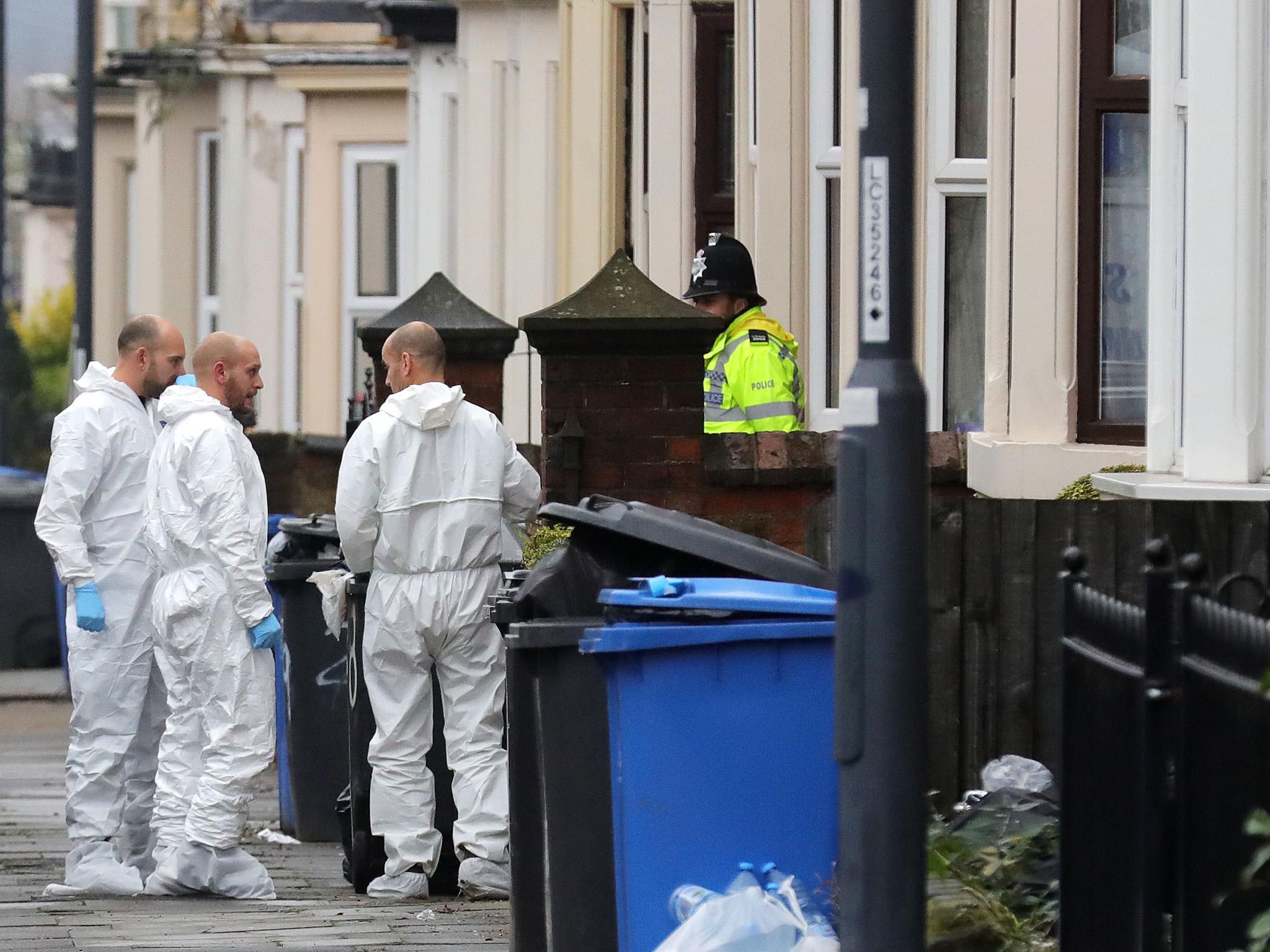 Forensics officers collect evidence at a house in Derby last week after the arest of four men in the city. Two were subsequently released without charge