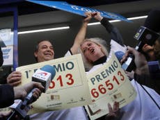 Single Spanish neighborhood wins 2.6 billion euro El Gordo lottery