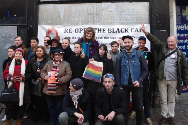 The Queer Tours of London group gather outside The Black Cap in Camden, an LGBT venue that closed following a battle over redevelopment