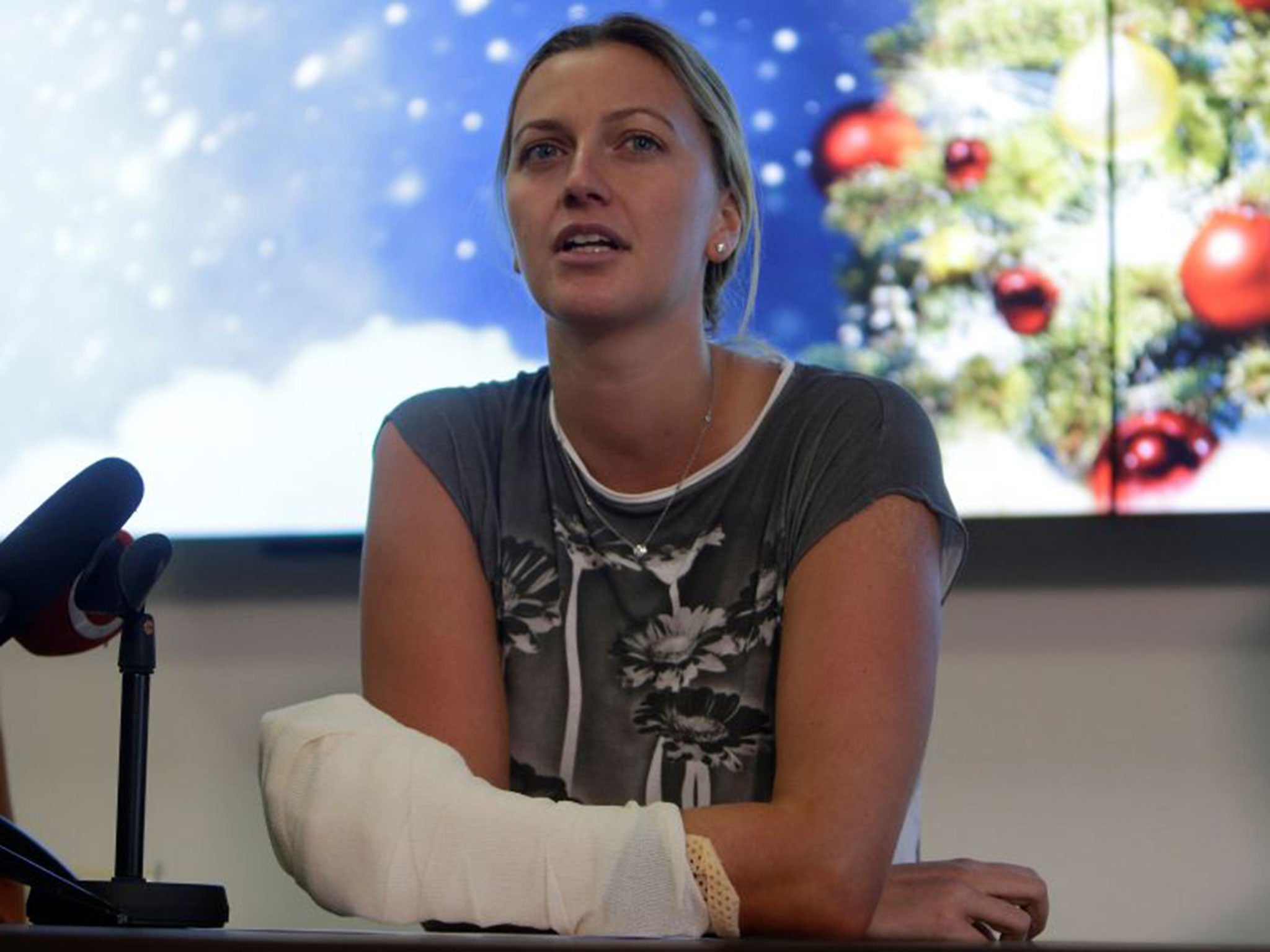 Petra Kvitova has left hospital after having a four-hour operation on her injured left arm