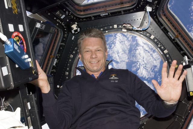 Astronaut Piers Sellers poses for a photo in the International Space Station in 2010