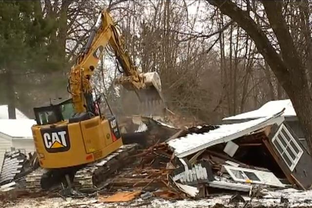 Screenshot from Fox News footage showing the demolition of the house where Danny Heinrich once lived
