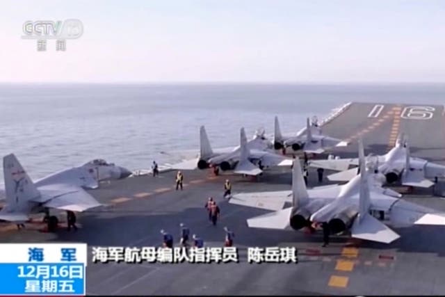 China has for the first time broadcast footage of the Liaoning carrier's drills