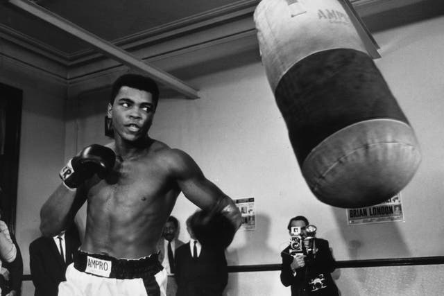 Muhammad Ali training with a punchbag in August 1966