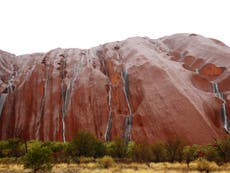 Record-breaking Christmas storm creates 'waterfalls' on Uluru