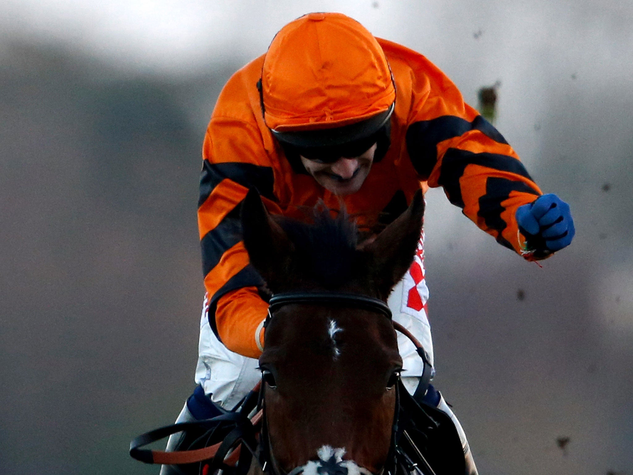 Tom Scudamore celebrates as he wins the King George VI Chase on Thistlecrack