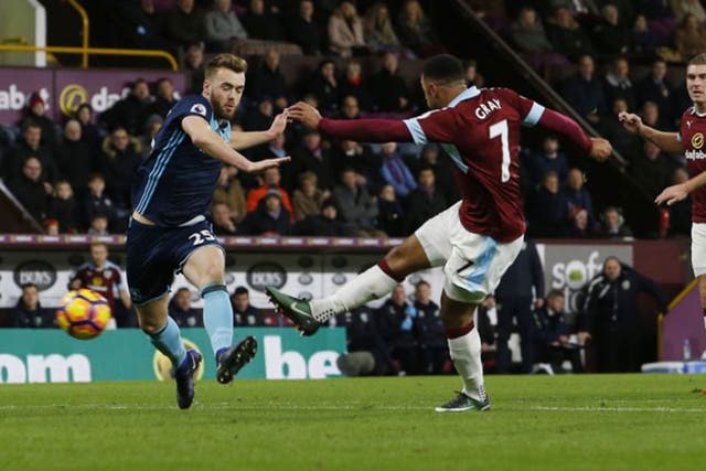 Andre Gray fires in Burnley's winning goal against Middlesbrough
