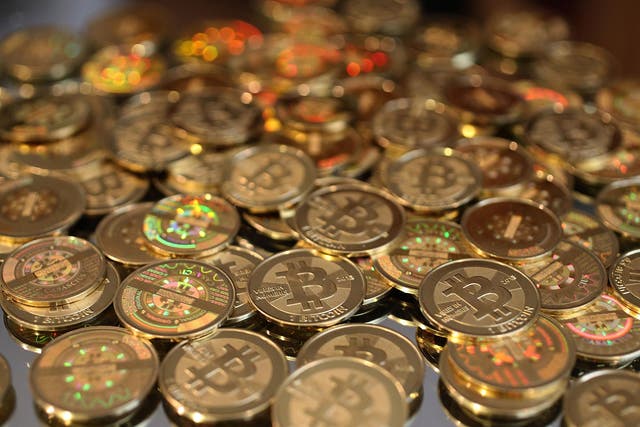 A Singapore startup plans to convert Bitcoin into major currencies via Visa cards readily available to spend in shops