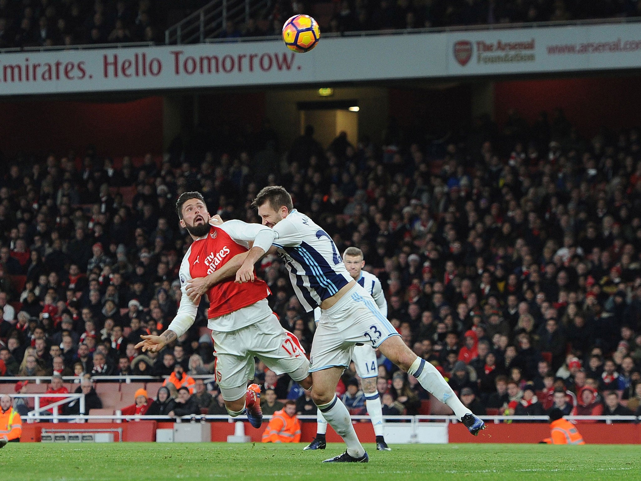 &#13;
Giroud heads home Arsenal's winning goal after out-muscling Gareth McAuley &#13;