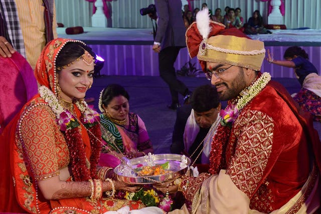Jay Savani, cousin of Mahesh Savani, weds his bride Divya at a mass wedding of 236 fatherless girls