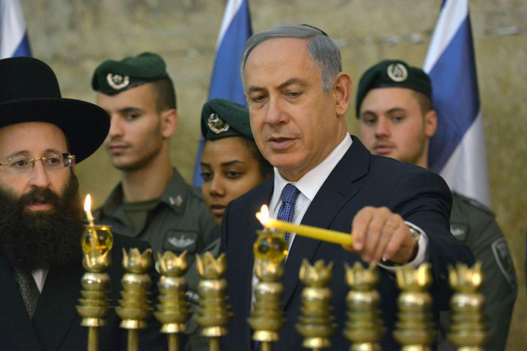 Mr Netanyahu visited the Western Wall during the Hanukkah holiday