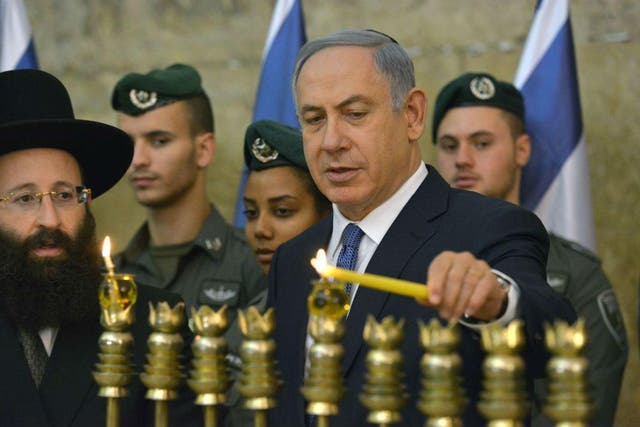 Benjamin Netanyahu visits the Western Wall during the Hanukkah holiday