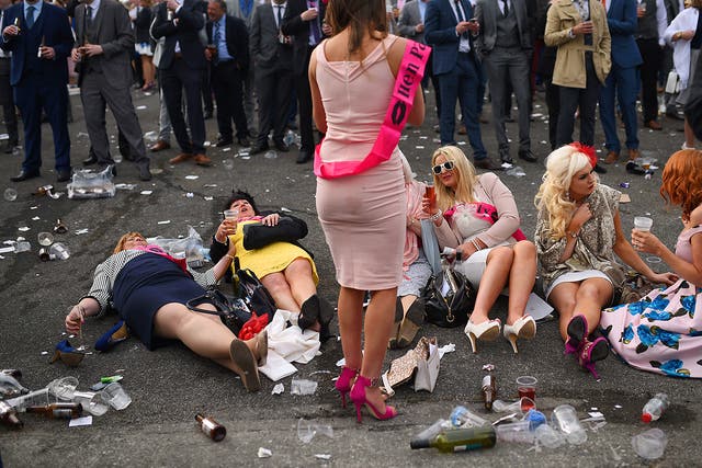 Ladies Day at the Grand National in April this year. Despite images like this frequently adorning front pages, men on average drink far more than women