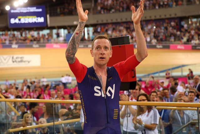 Bradley Wiggins celebrates breaking the UCI One Hour Record at Lee Valley Velopark Velodrome on June 7, 2015 in London