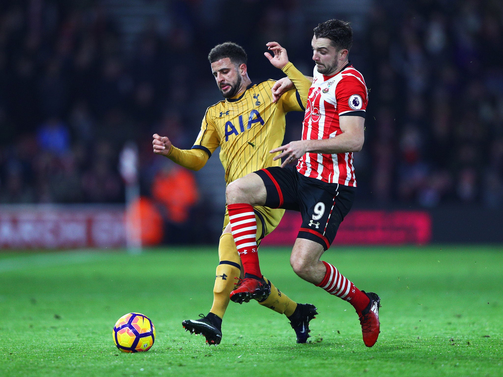 Jay Rodriguez tussles for possession with Kyle Walker