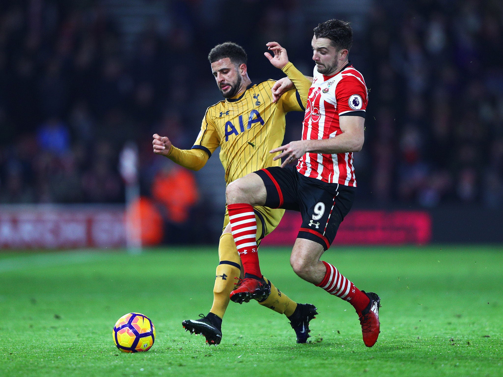 Kyle Walker and Jay Rodriguez tussle for possession