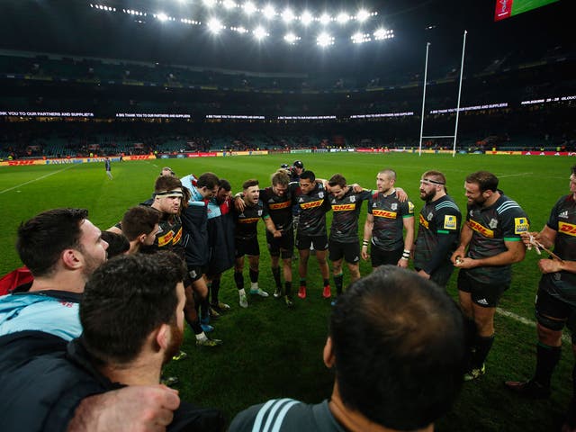 Danny Care talks to his Harlequins team mates after victory against Gloucester the 'Big Game 9'