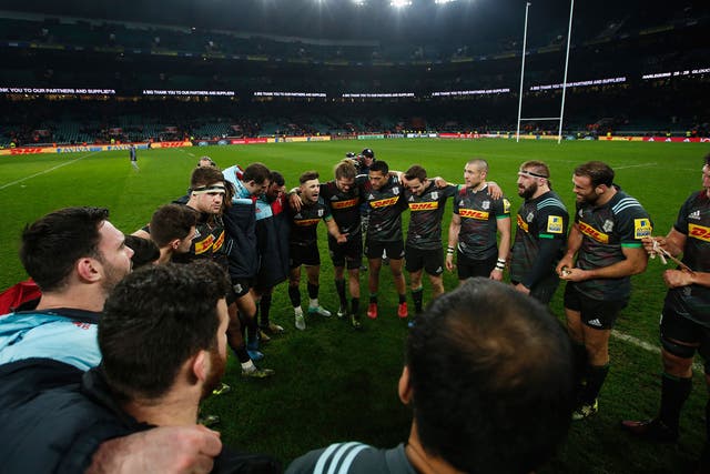 Danny Care talks to his Harlequins team mates after victory against Gloucester the 'Big Game 9'