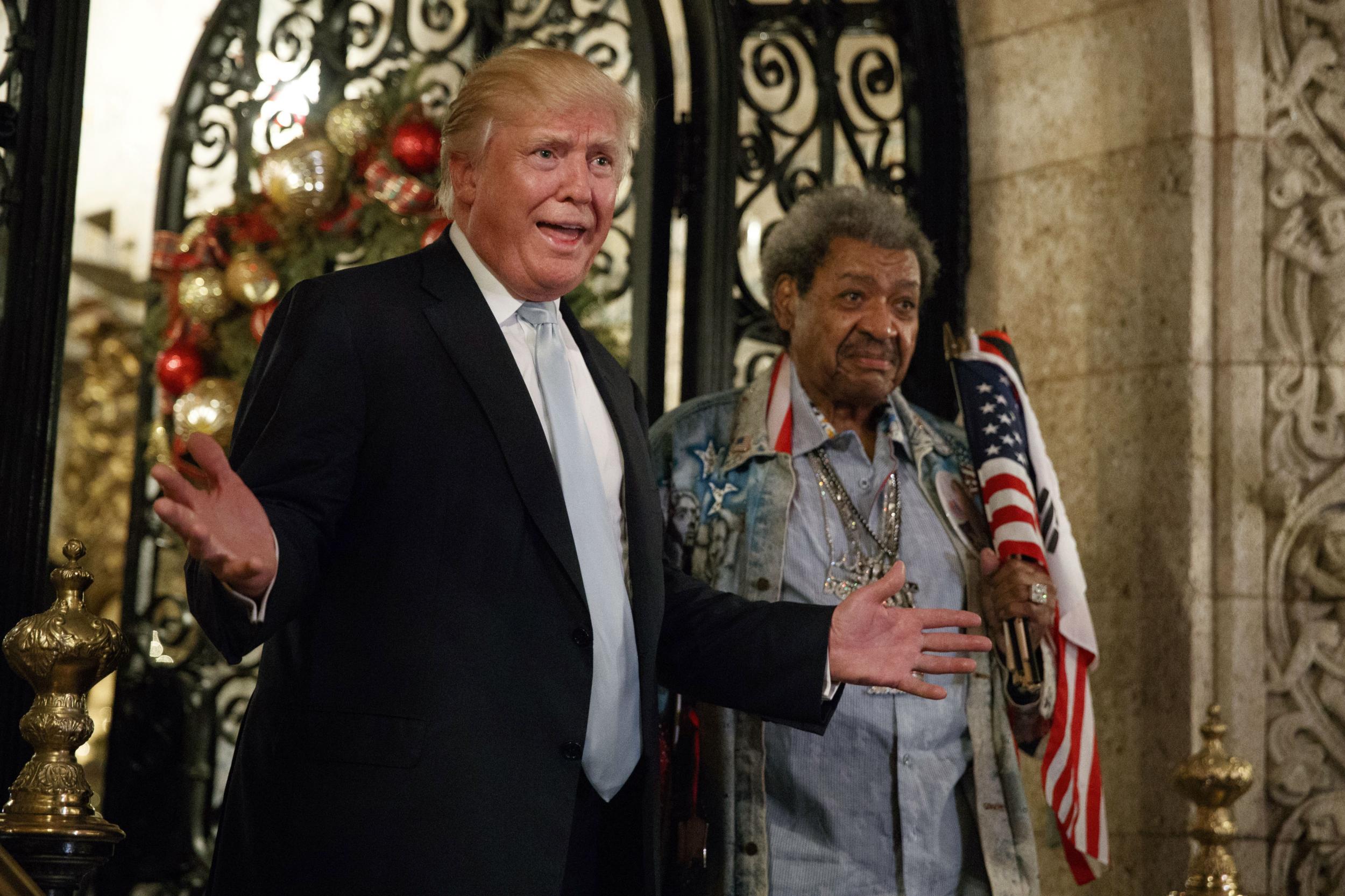 Mr Trump spoke to reporters alongside boxing promoter Don King