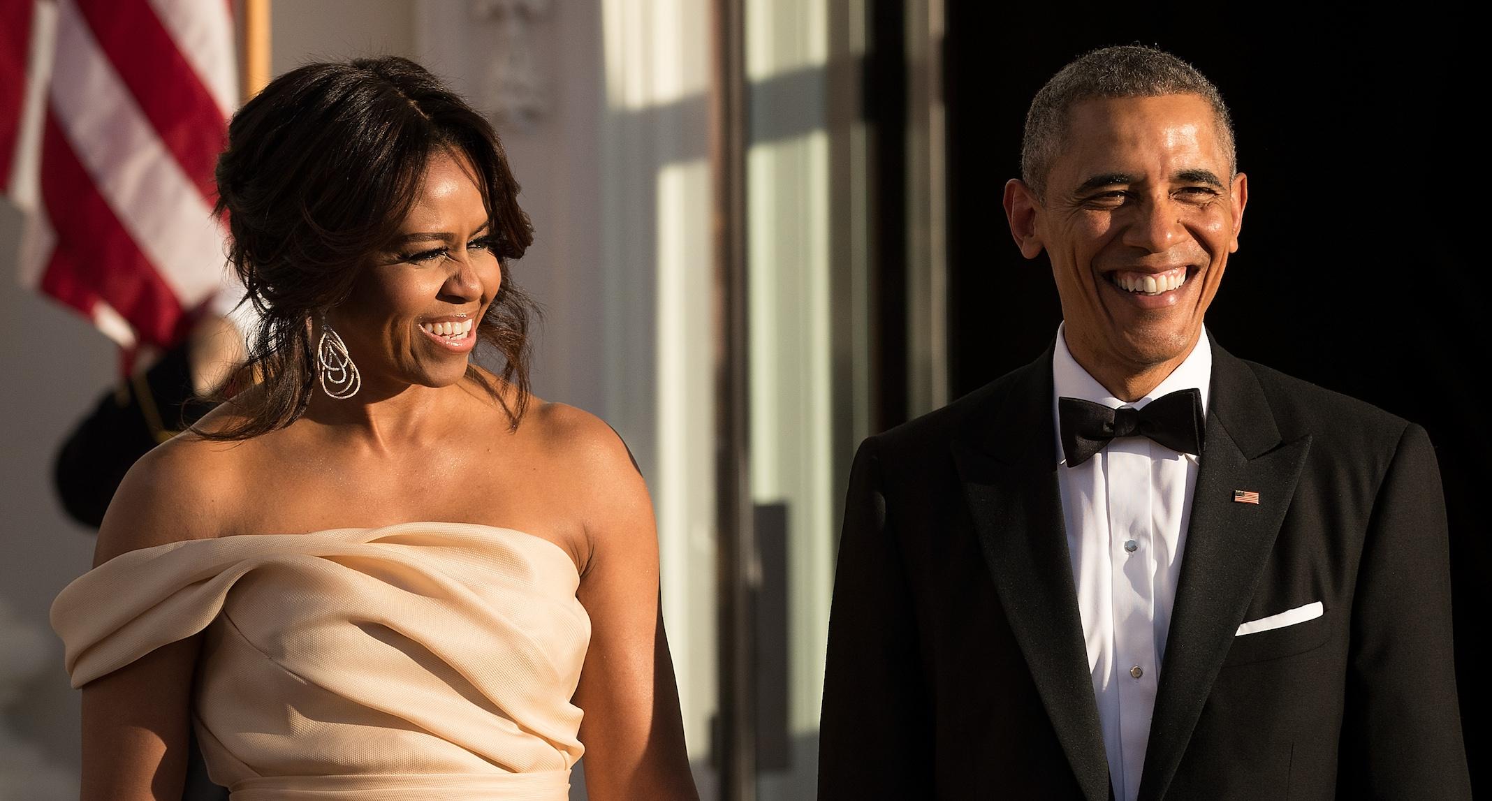 First Lady Michelle Obama and U.S. President Barack Obama wait for leaders to arrive for the Nordic state dinner on the North Portico at the White House, May 13, 2016, in Washington, DC.