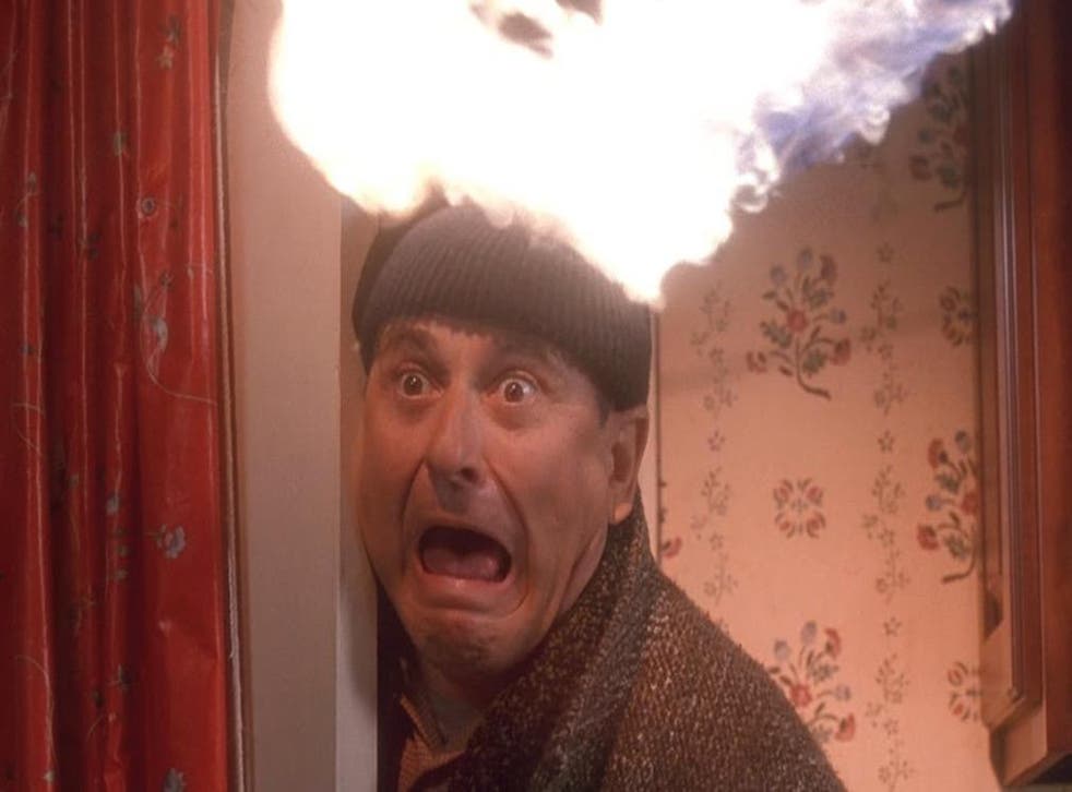 Joe Pesci gets his head roasted with a blowtorch in Home Alone