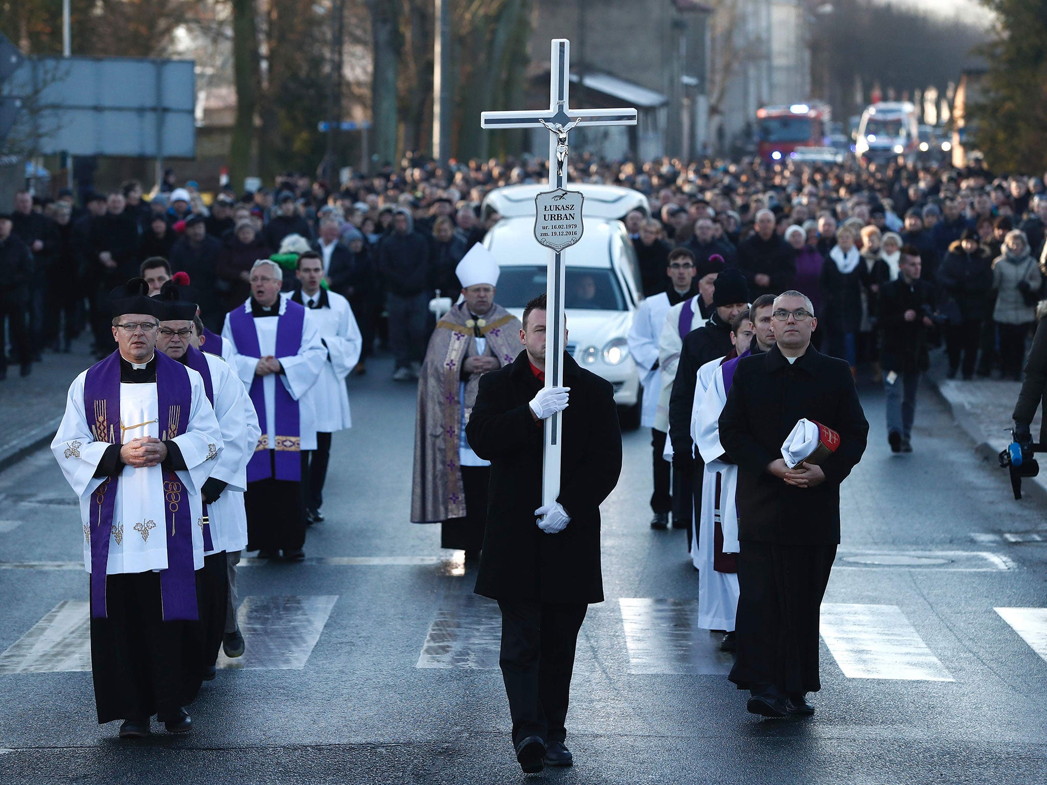 Mourners attend the funeral of Lukasz Urban, the Polish lorry driver who was killed in the Berlin Christmas market attack, in Banie, Poland, on 30 December