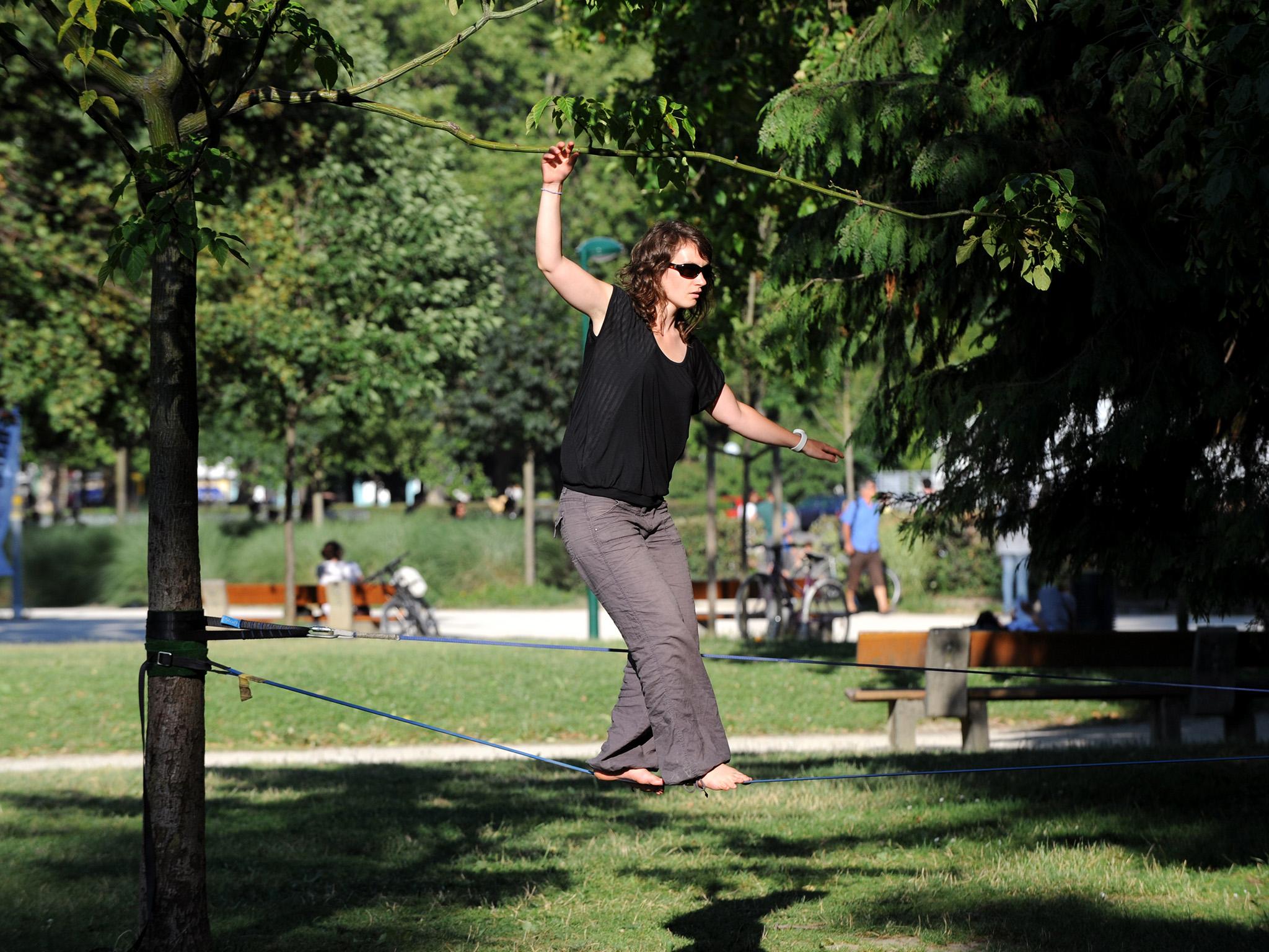 New balance: slacklining, which engages all the muscles, is set to be big (Getty)