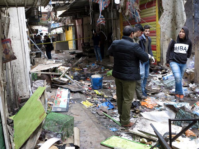 Twin attacks claimed by Isis in Baghdad on New Year’s Eve killed 24 people