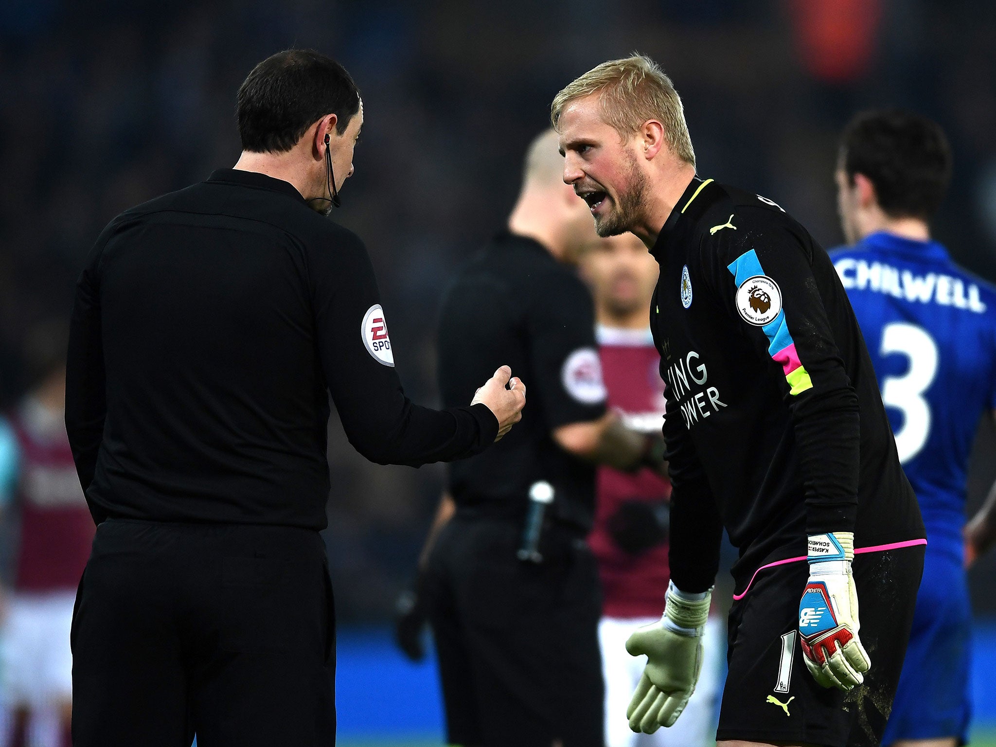 Kasper Schmeichel argues with the fourth official during the win over West Ham