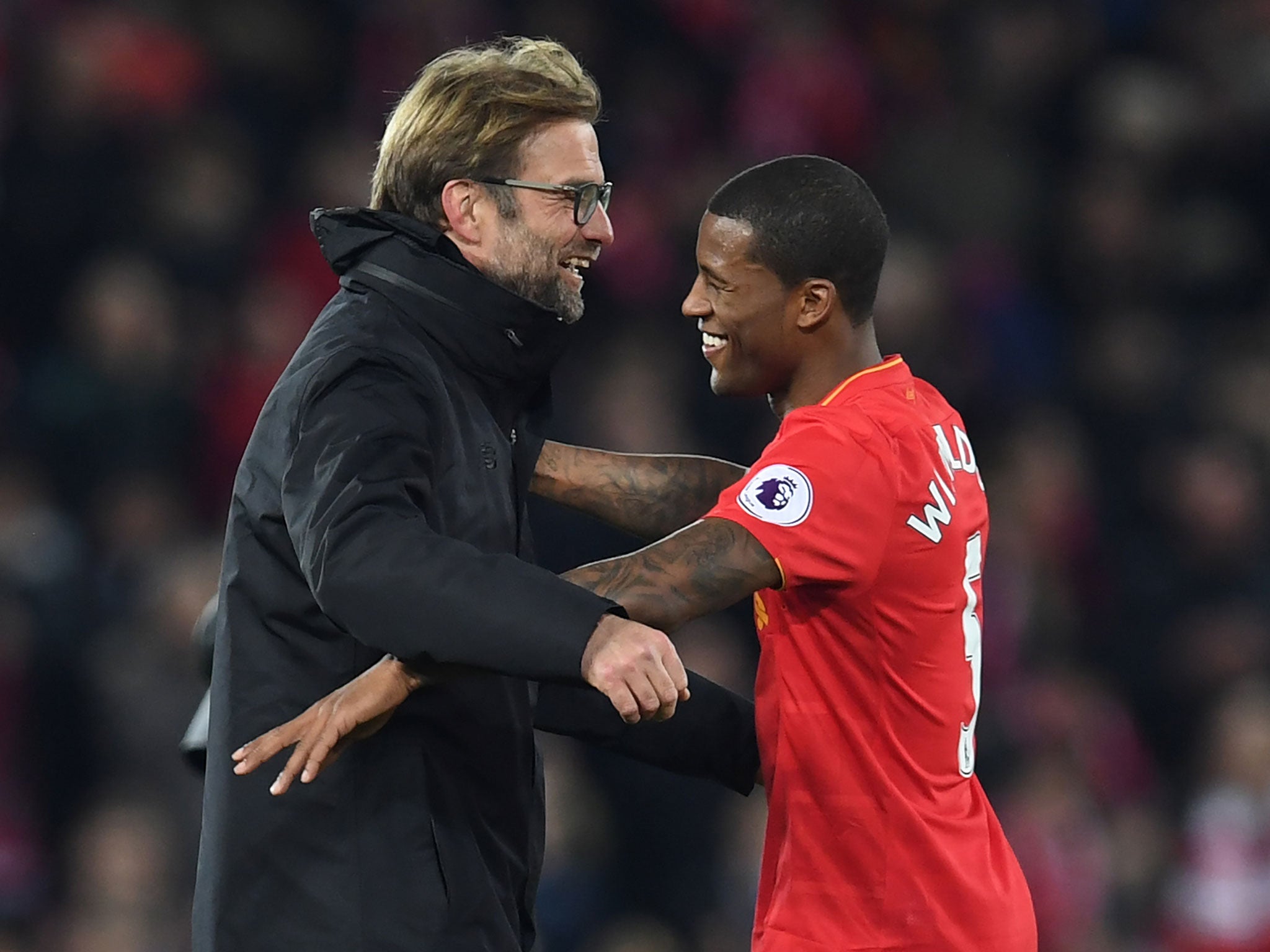 Jurgen Klopp embraces Wijnaldum after Liverpool's win over Manchester City