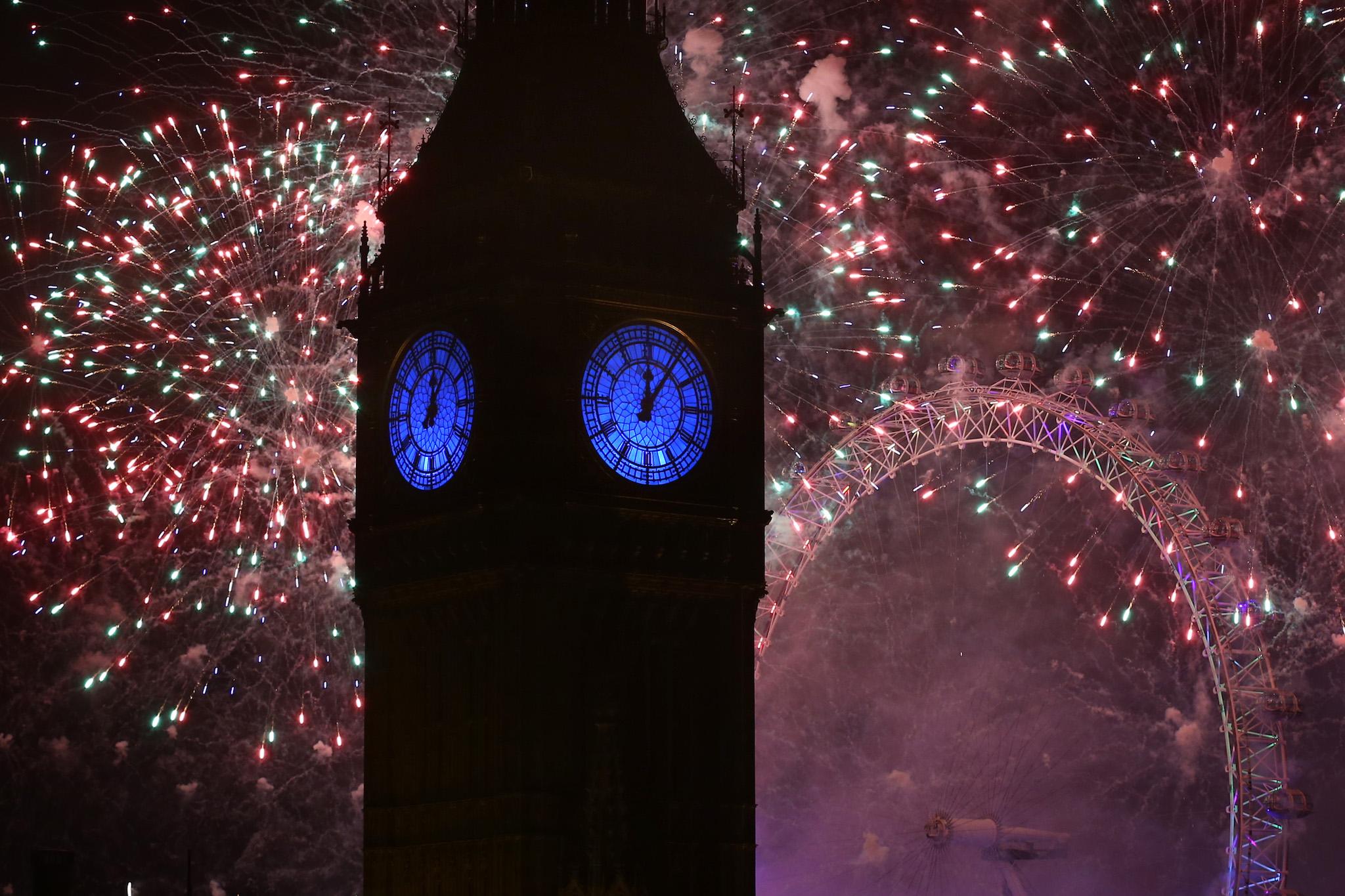 Fireworks light up the London skyline and Big Ben just after midnight on January 01, 2016 in London, England
