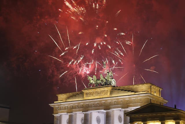 Fireworks explode next to the Quadriga sculpture atop the Brandenburg gate during New Year celebrations in Berlin, Germany, January 1, 2017
