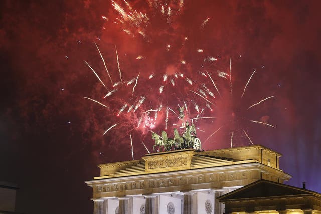 Fireworks explode next to the Quadriga sculpture atop the Brandenburg gate during New Year celebrations in Berlin, Germany, January 1, 2017